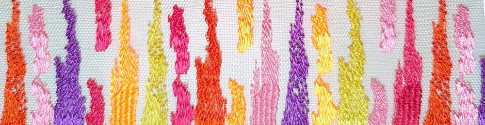 DETAIL OF COLORFUL EMBROIDERY